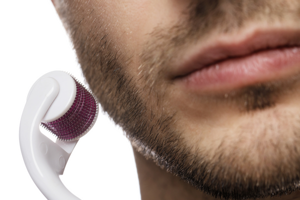 man with facial hair using derma roller, urth