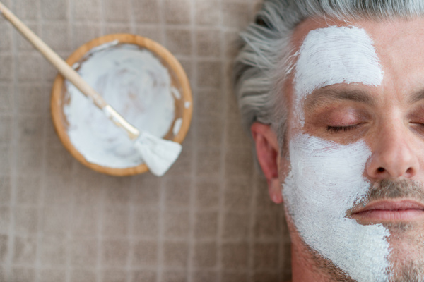 clay mask during a men's facial for clear complexion, urth