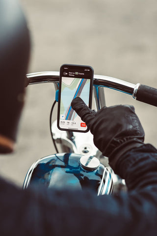 motorcyclist using phone