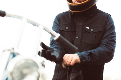 rider putting on glove