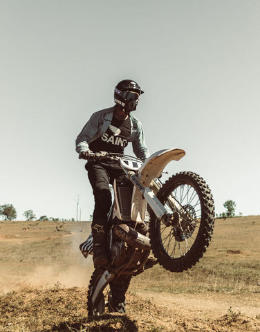 motorcycle rider doing a wheelie