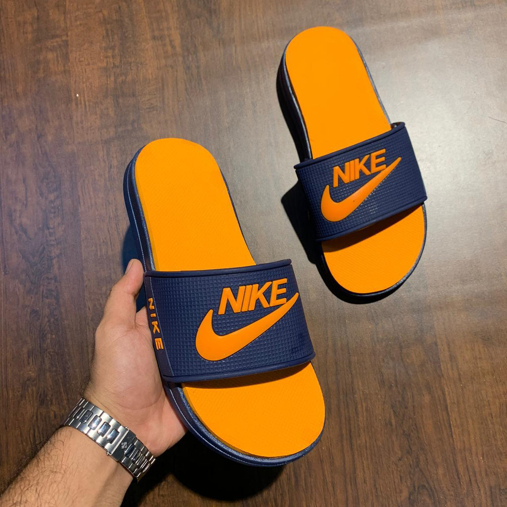 orange nike flip flops