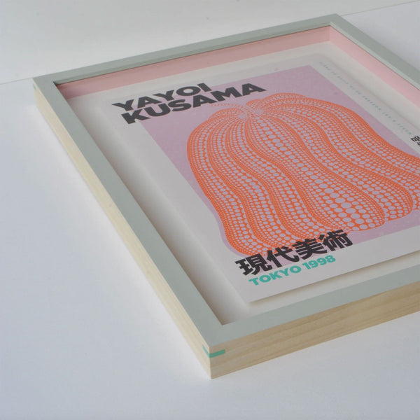 Custom framed artwork with colourful pale pink slip.