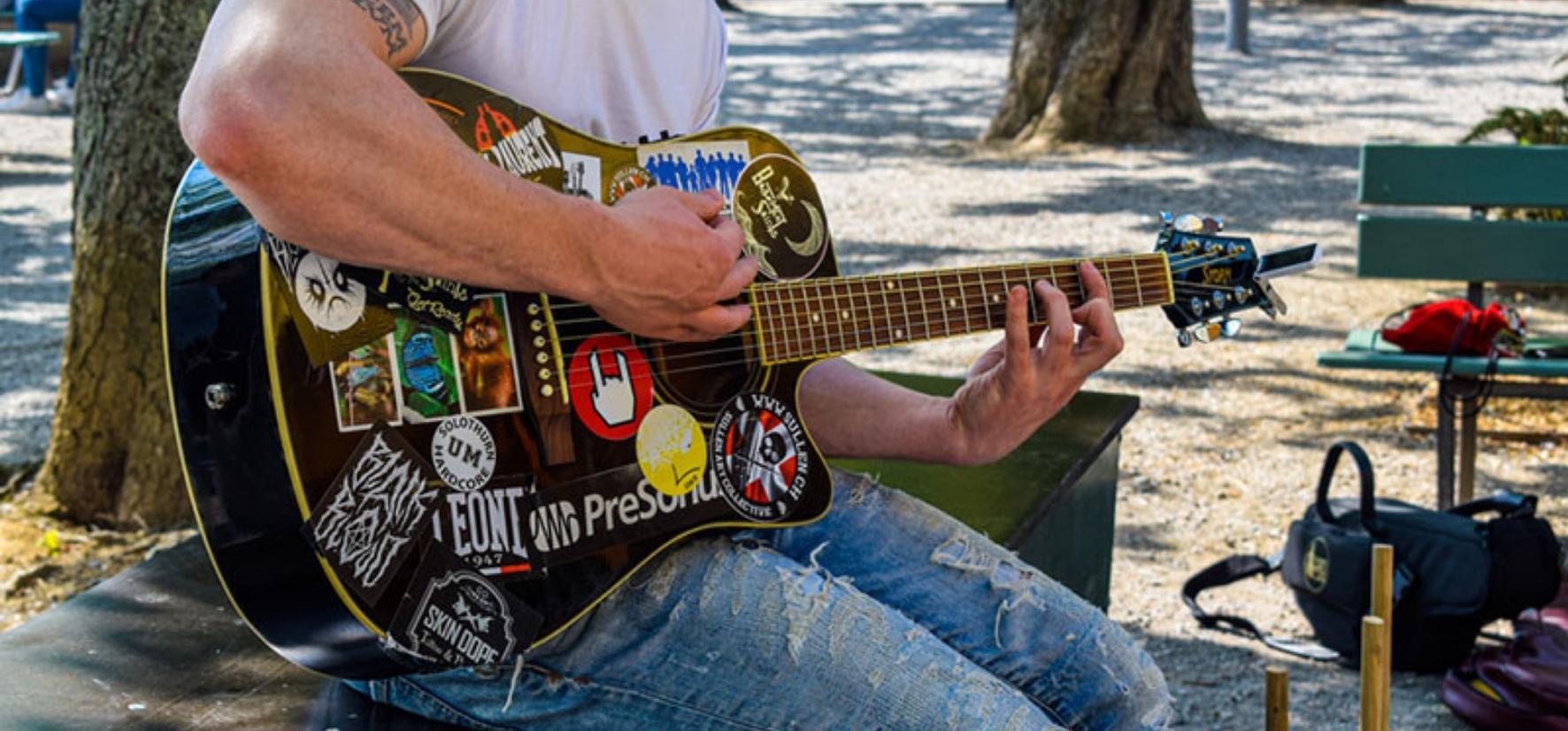 guitarist-with-stickers-for-guitar