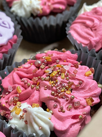 Pink cupcake with sprinkles