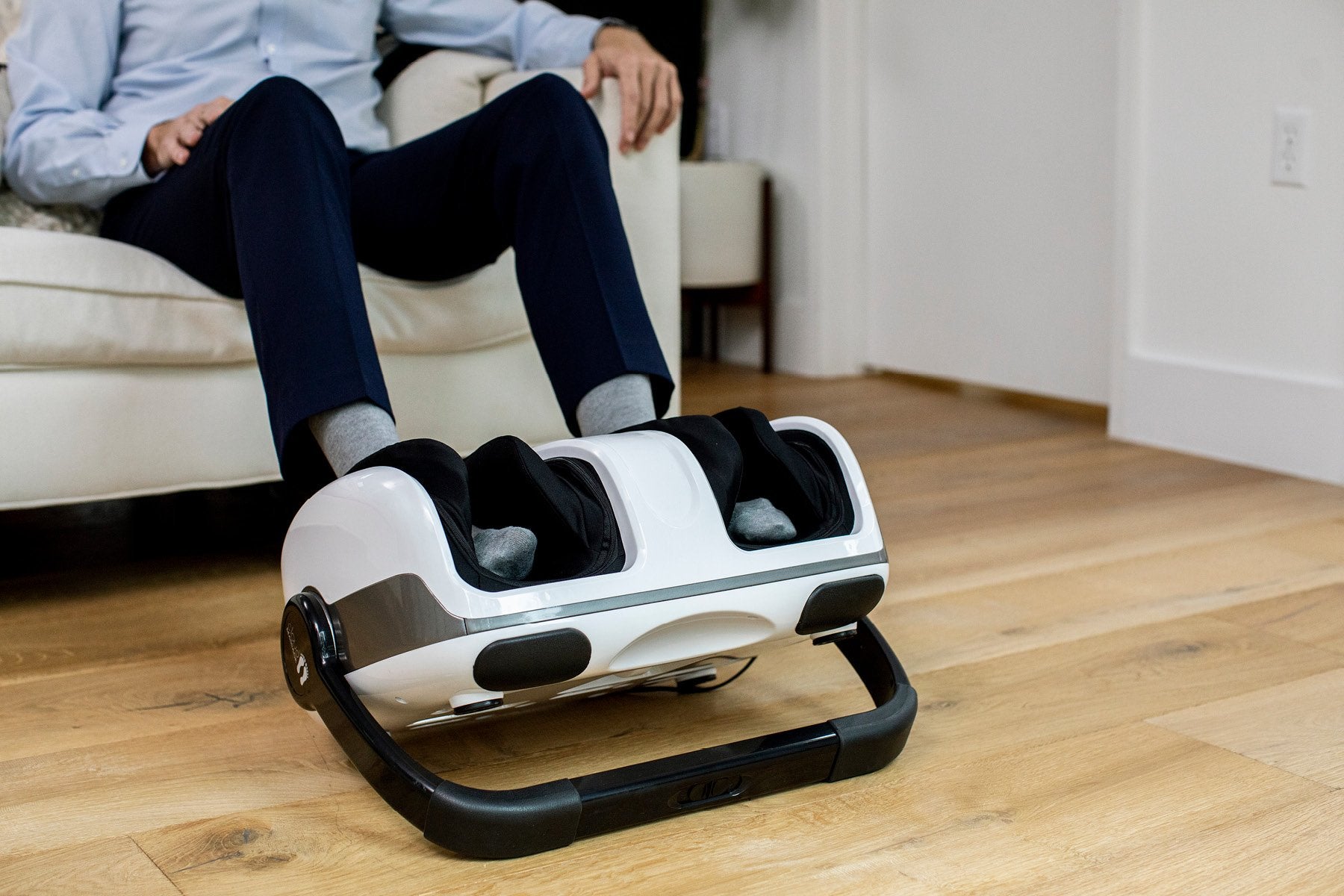 Man using calf massager for plantar fasciitis