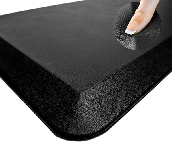 Woman poking at anti-fatigue floor mat