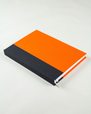 hand-bound lined notebook, orange & black