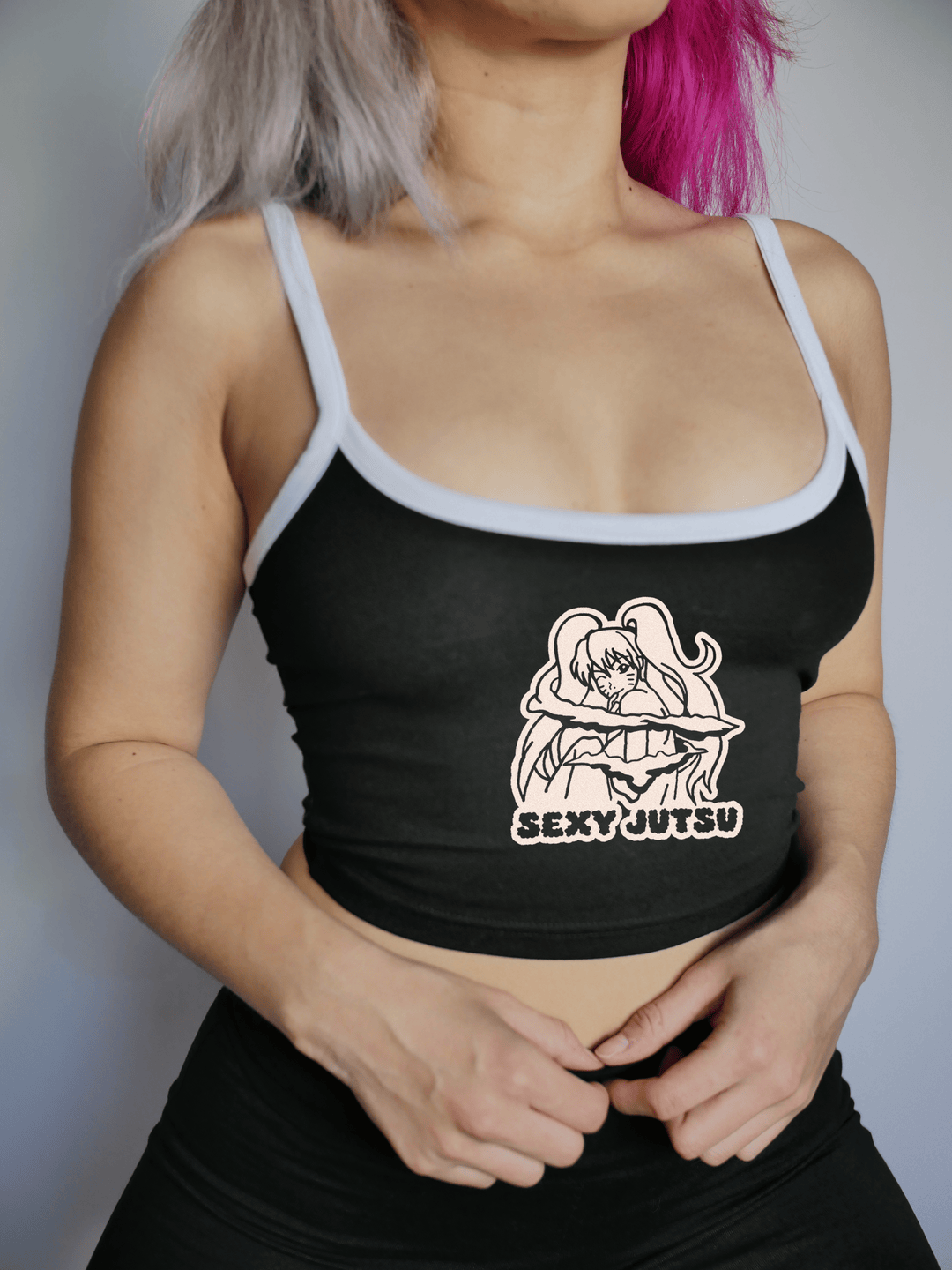 https://cdn.shopify.com/s/files/1/0438/6884/8285/products/pixelthat-punderwear-cami-crop-top-sexy-jutsu-cami-crop-top-41055844303122.png?v=1679671414&width=1080