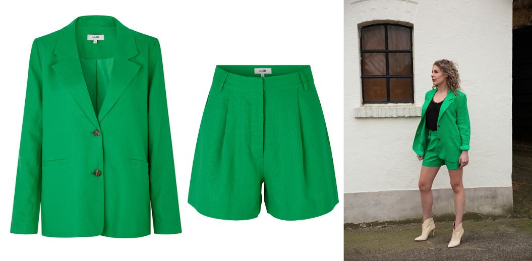 Green women's suit with Bermuda shorts. The summer suit of 2022. The power suit, also called the co-ord, two-piece or trouser suit, will remain a trend in 2022. We're seeing a lot of women's suits this spring. Such as brightly colored women's suits, denim trouser suits, beige linen suits, classic suits and two-pieces with Bermuda trousers.