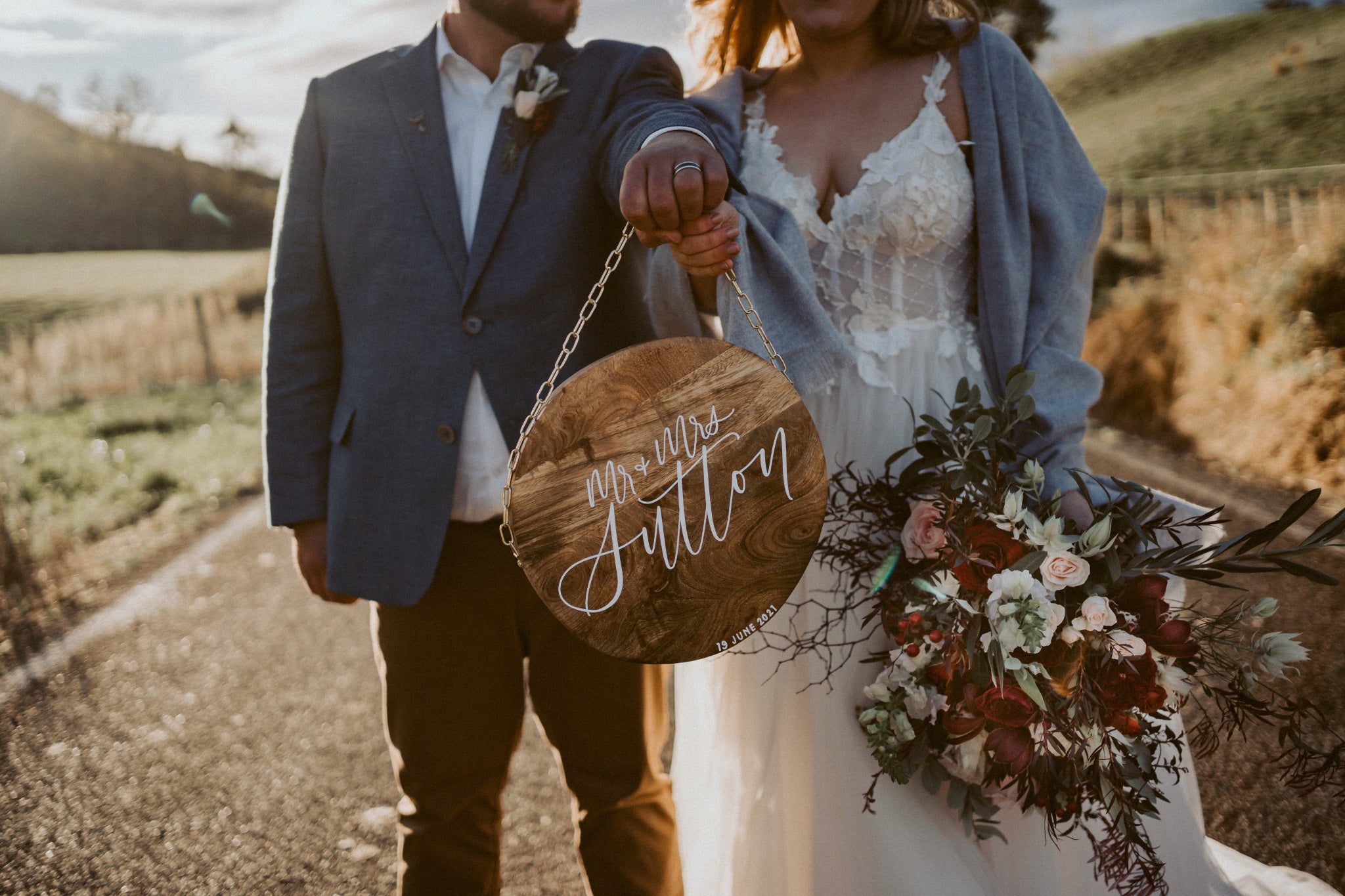 Lily + Josh | Newlywed wood name plaque sign | The Paper Gazelle Wedding Feature