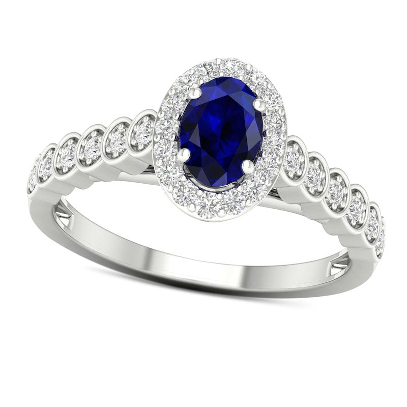 Oval Blue Sapphire and 0.20 CT. T.W. Natural Diamond Frame Scallop Shank Ring in Solid 10K White Gol