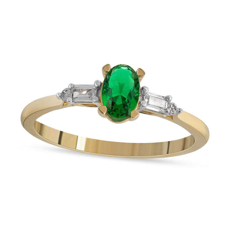 Oval Emerald and 0.10 CT. T.W. Baguette and Round Natural Diamond Side Accent Ring in Solid 10K Yell