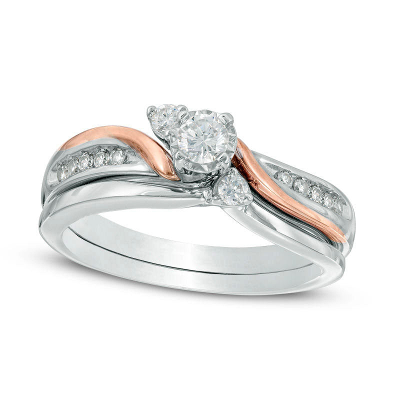 Previously Owned - 0.33 CT. T.W. Natural Diamond Three Stone Slant Bridal Engagement Ring Set in Sol