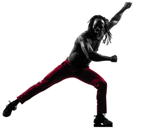 Black man in powerful dance pose