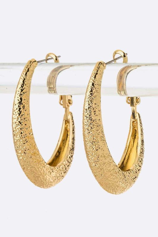 OE: Textured Iconic Gold Tone Oval Hoop Earrings