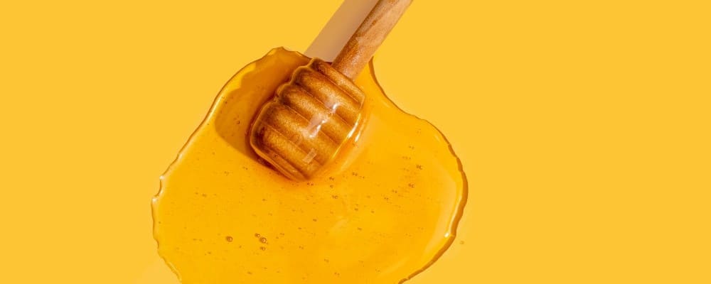 cuillere a miel fond jaune
