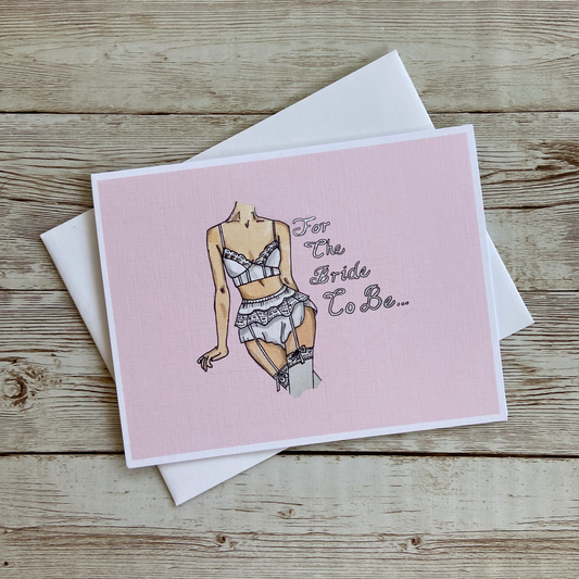 greeting card with illustration of a woman's body in white lingerie 