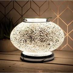 An image of a Silver Mosaic Desire Aroma Halogen Lamp in crackled glass, perfect for mixing and matching scents to create your own aroma for your home. The lamp can be used with both wax melts and fragrance oils, and features 3-touch sensitive light settings to control the mood of the room. A great gift idea for someone special or as a housewarming present.