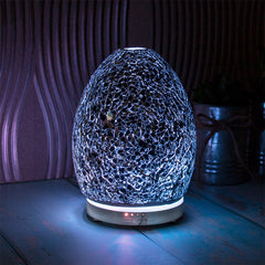 Black Mosaic LED Colour Changing Aroma Diffuser. Showcasing LED Lights in a dark setting