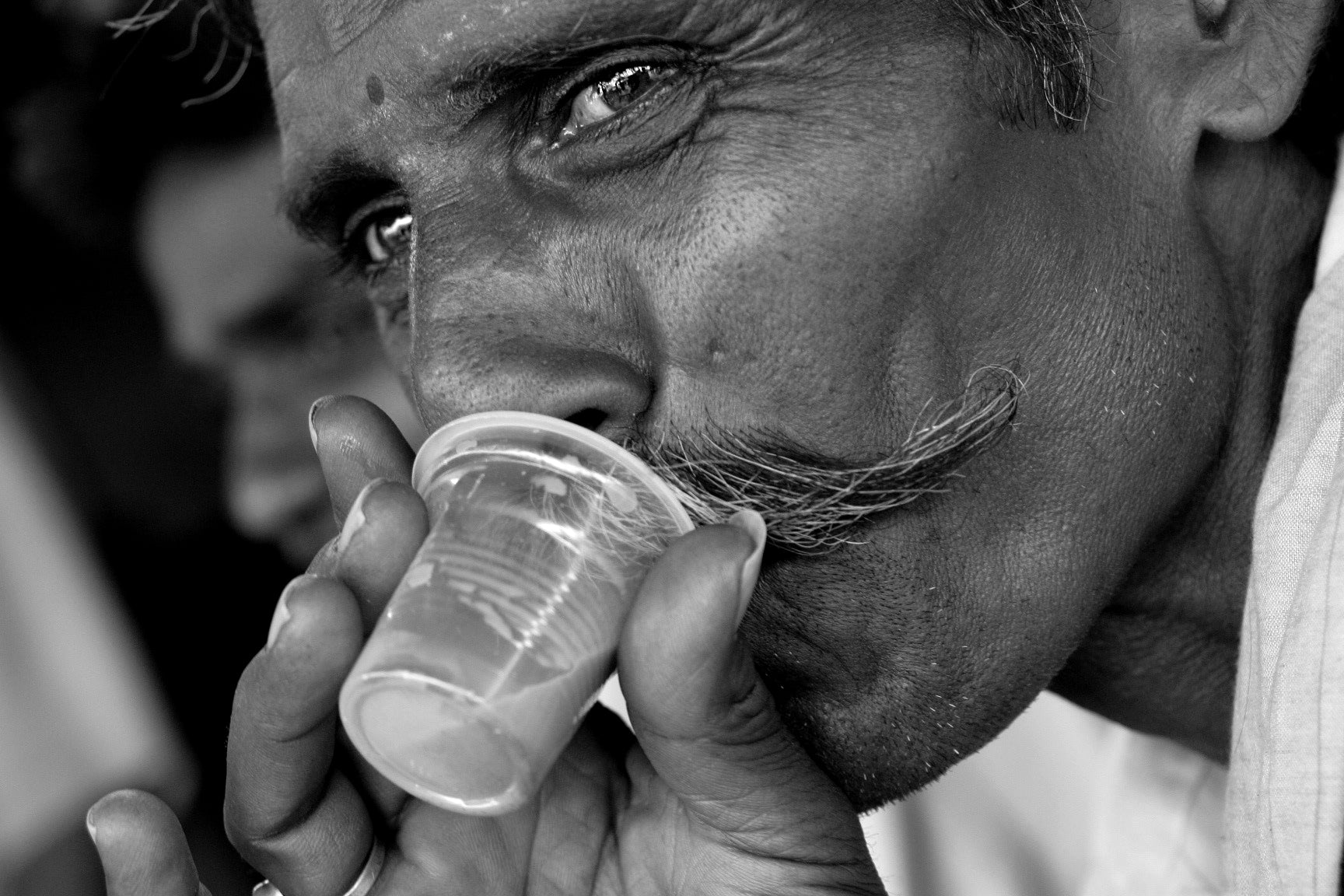 A Man Drinking Chai Tea In Hyderabad, India