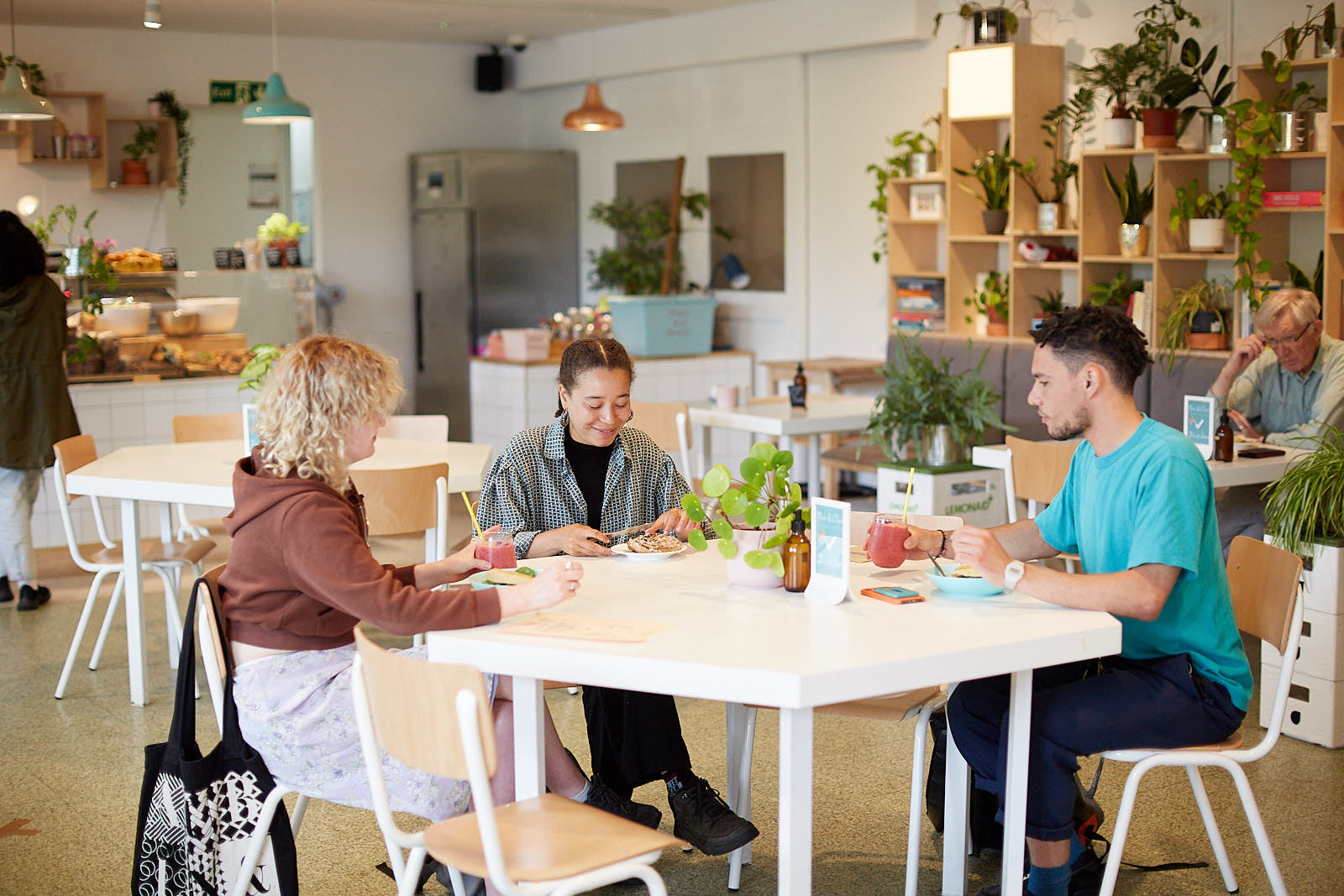 Customers Drinking Inside of Emmeline Cafe