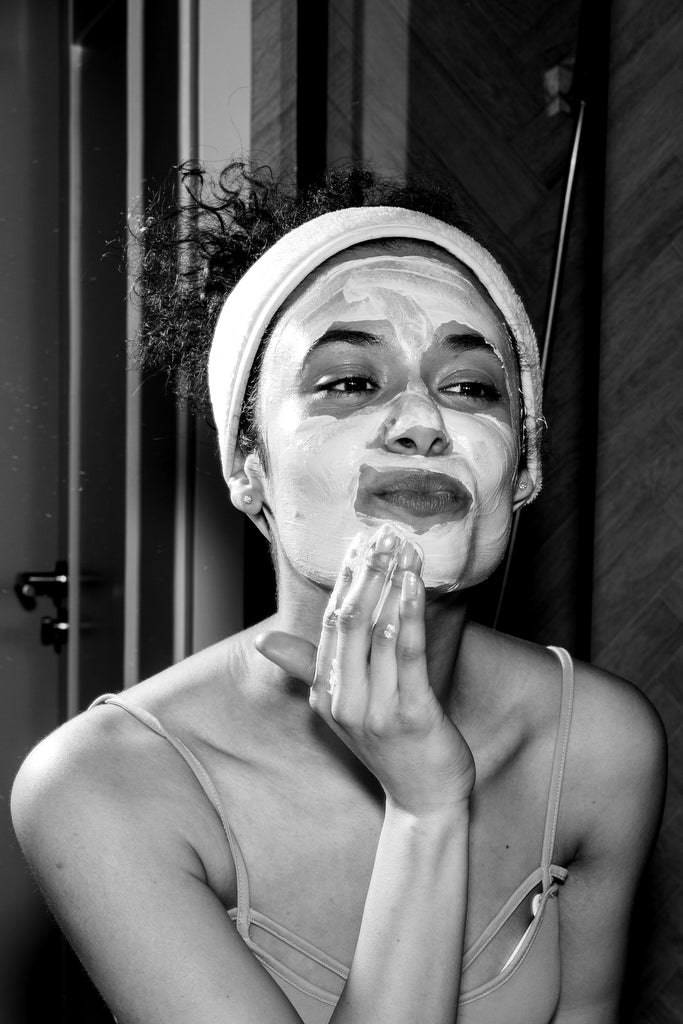 Woman Applying Face Cream