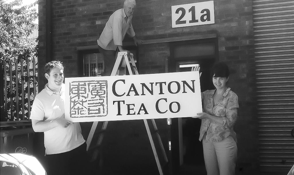 Canton business partners, Edgar and Jennifer outside their first office warehouse