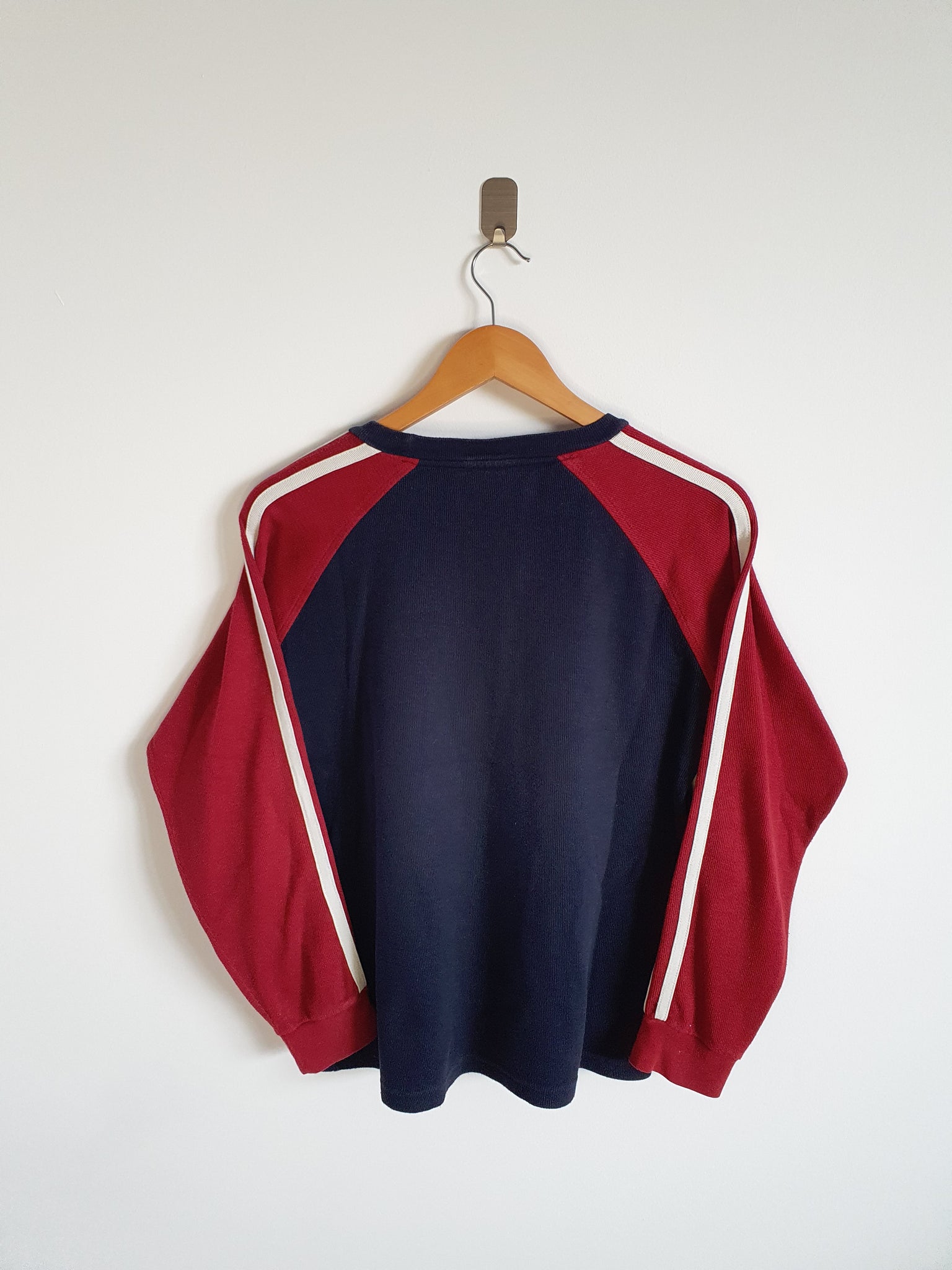 red tommy jumper