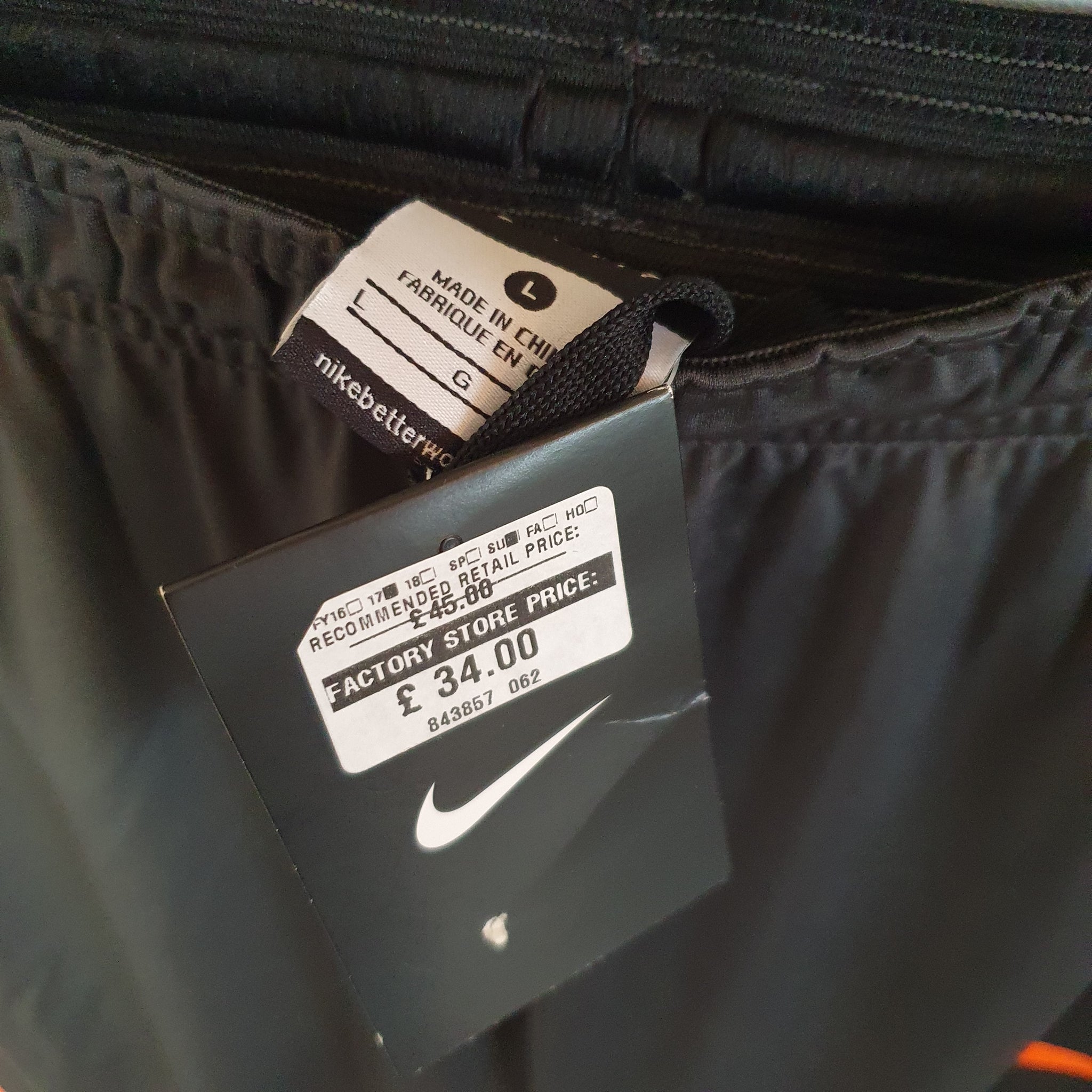 nike black and orange tracksuit