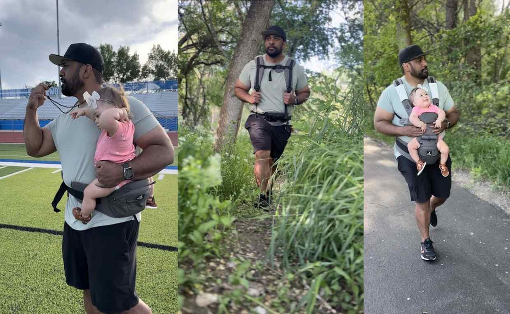 Dad holding baby in Huggs carrier while coaching and hiking