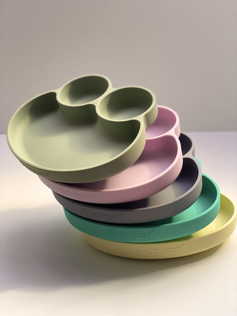 stack of colorful Abiie® Octopod® frog plates