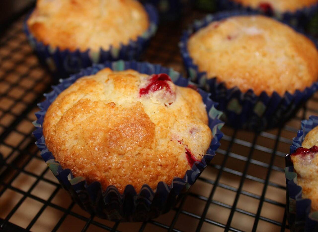 cranberry muffins in blue muffin holders