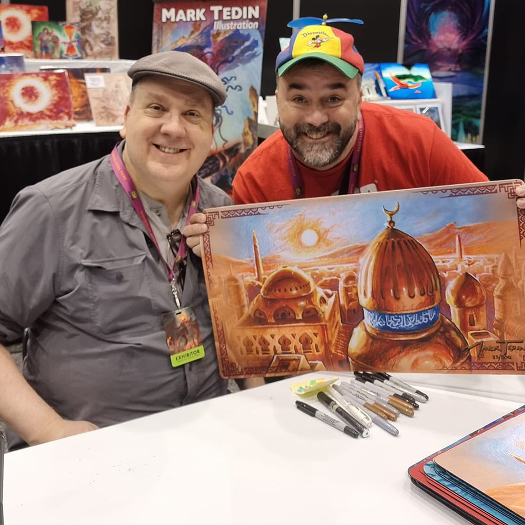 Mark Tedin & Filippo Lietti with a City of Brass playmat.