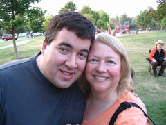 Head shot of Charleen and Trevor Edis in a park