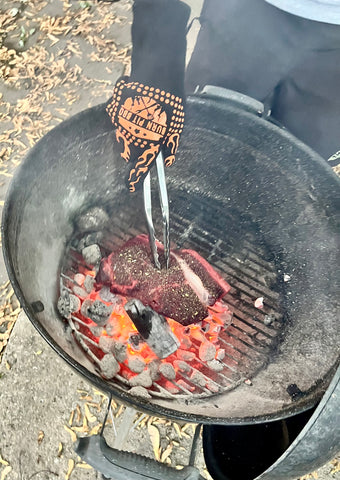 Using Tongs On Steak