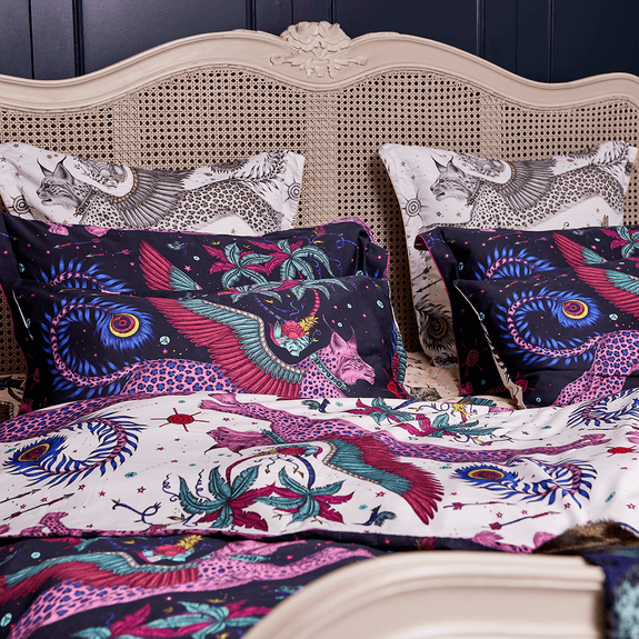Navy/white | Transform your bedroom into a Magical Lynx inspired dream with the Lynx Pillowcase pair in Navy and White, designed by Emma J Shipley. Featuring a striking scene of creatures including a flying Winged Lynx with peacock tails.