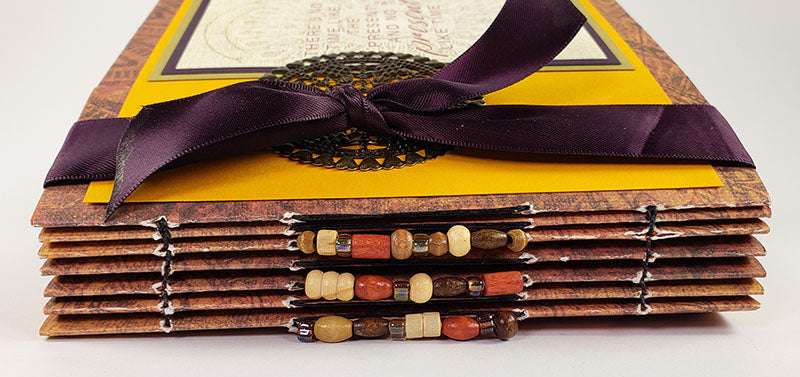 Stitched spine with beads - Handmade book by Karen Wyngaard