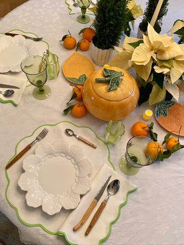 a dining table setup with pumpkin and fall vibes