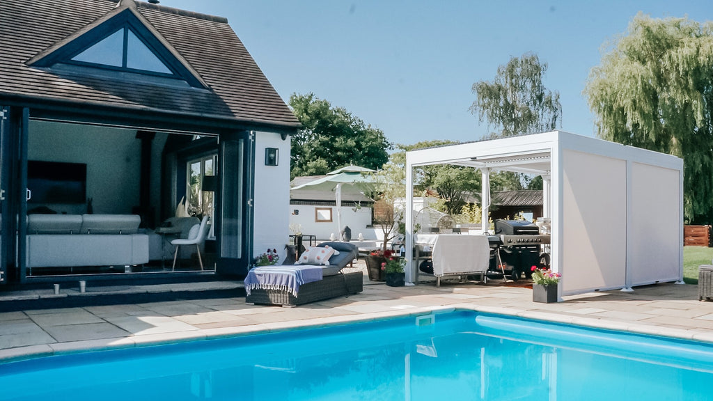 Pergola next to swimming pool