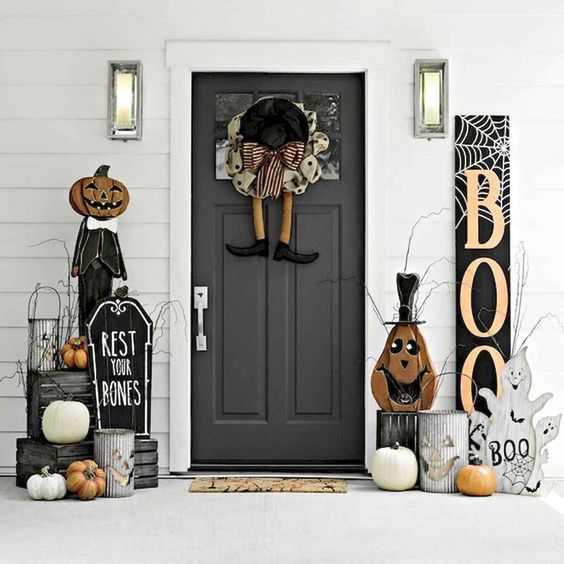 Halloween decorations on a white entryway.