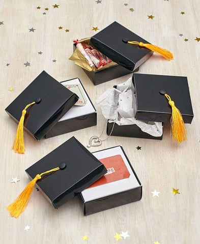 4 Graduation Party Favours in black boxes with a Grad Cap as the lid