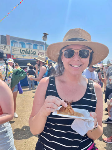 Miss Fizzwick enjoying a sunny day at Jazz Fest in New Orleans, LA