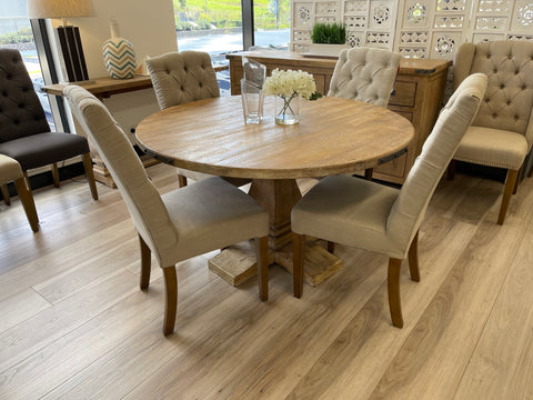 contemporary country style dining setting with ballast leg and fabric chair