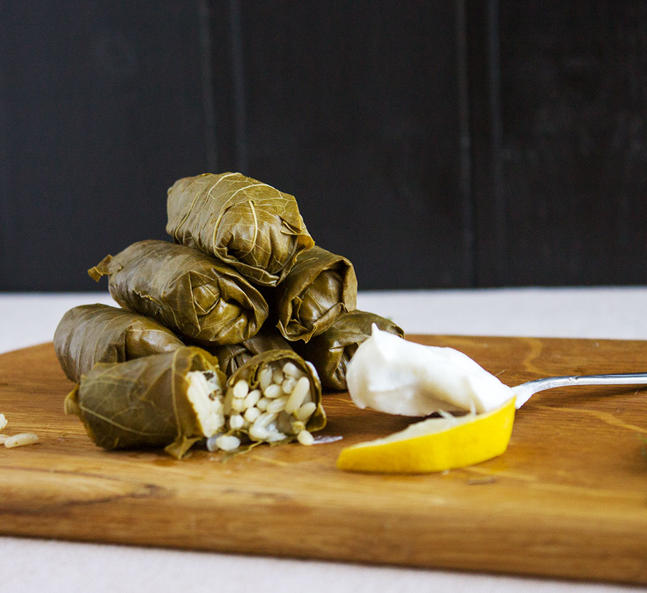 Dolmades are traditional grape leaves stuffed with rice