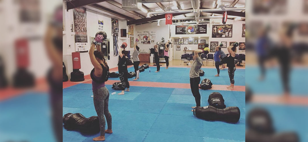 People working out in Cage Fitness class