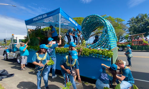 Mauna Loa team members making final touches to our float minutes before the parade