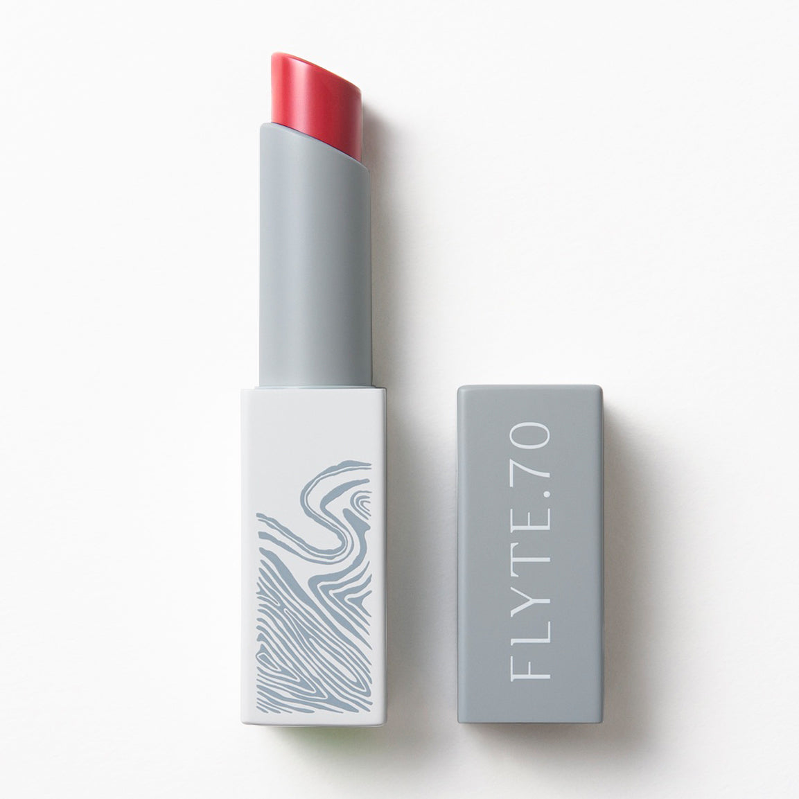 Sporty tube of lipstick in soft watermelon shade