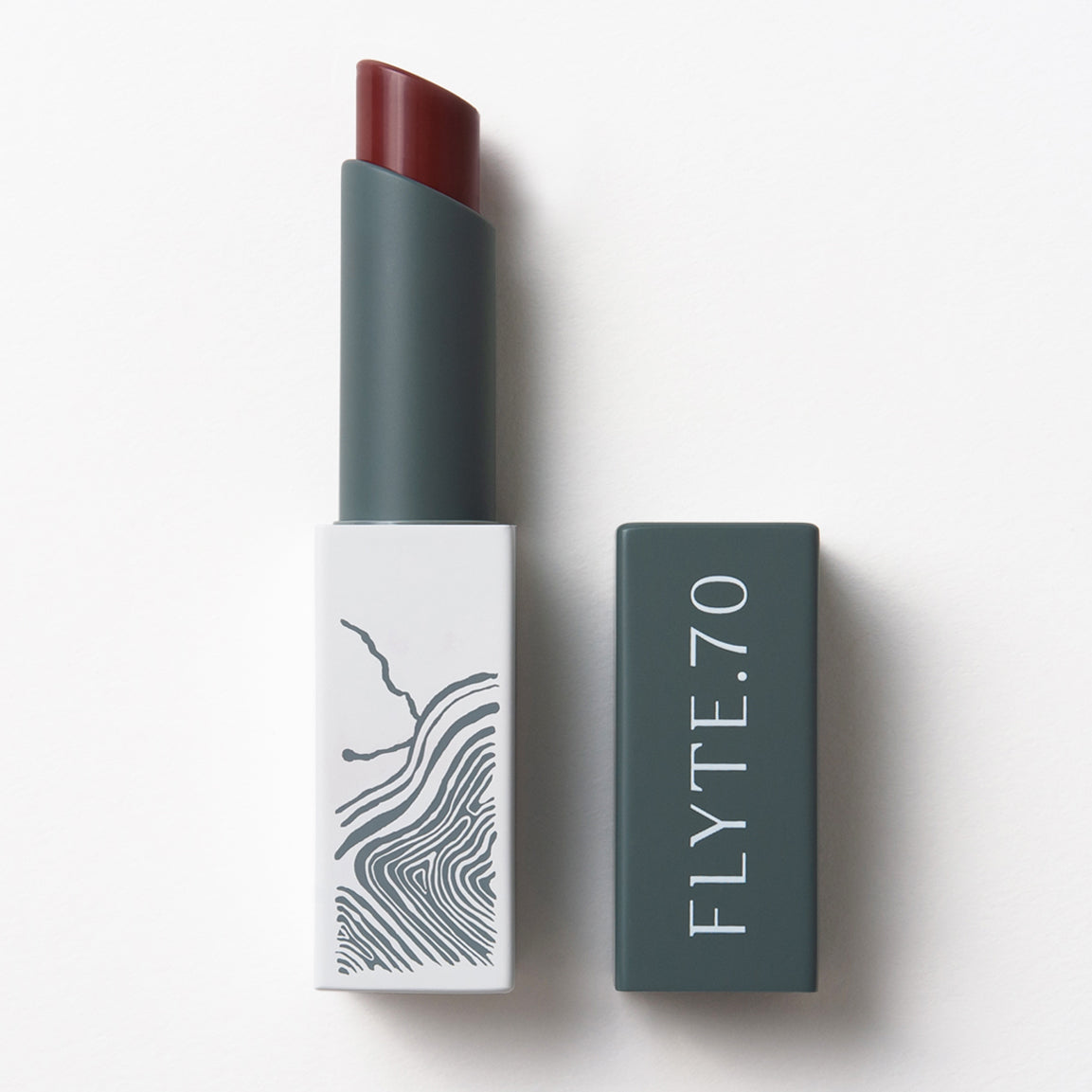 Sporty tube of lip lacquer in reddish amber 