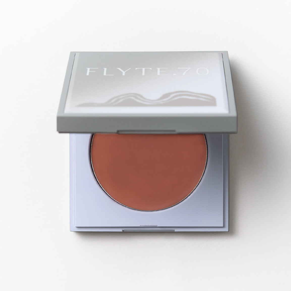 Compact of cream blush in burnished amber shade
